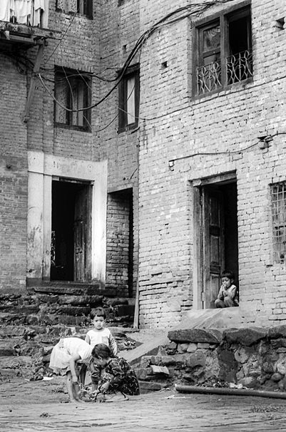 Children In The Stone-paved Street (Nepal)