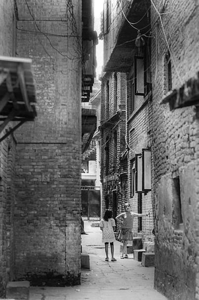 Two Girls Standing In The Lane (Nepal)