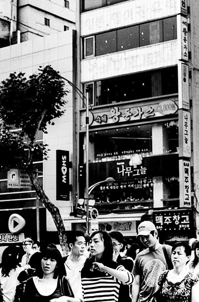 Pedestrians Crossing At The Cross Walk (South Korea)