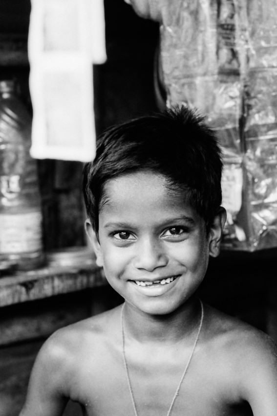 Boy looking after shop