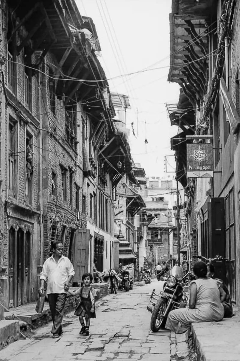 Father and daughter walking hand in hand