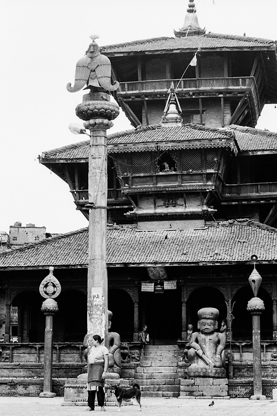 Woman in front of Hindu temple