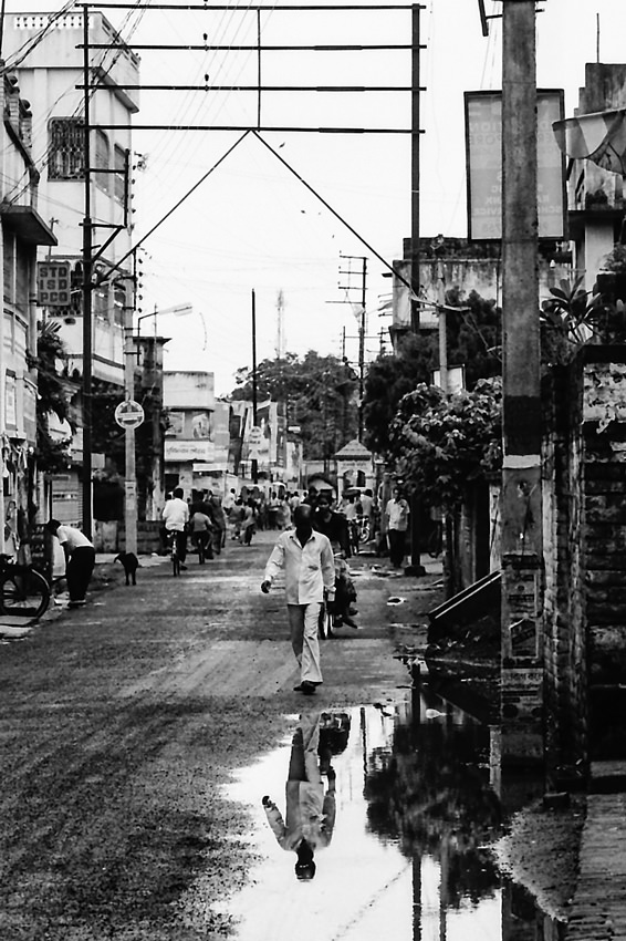 Pedestrian in puddle