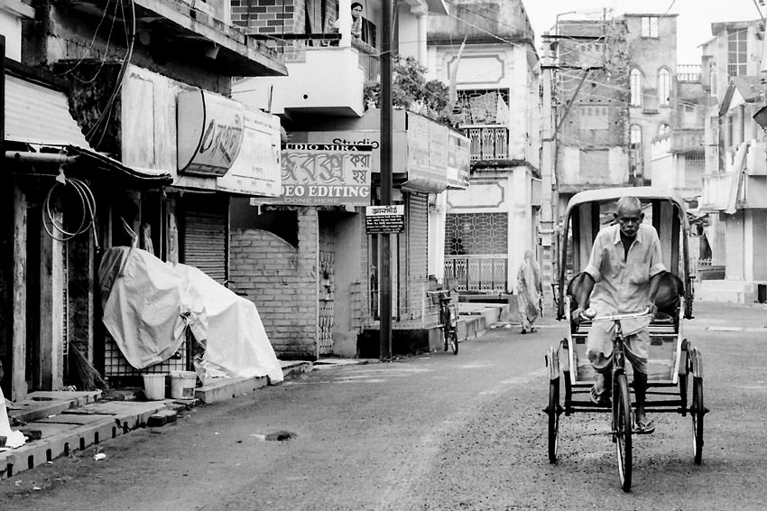 Cycle rickshaw in deserted street