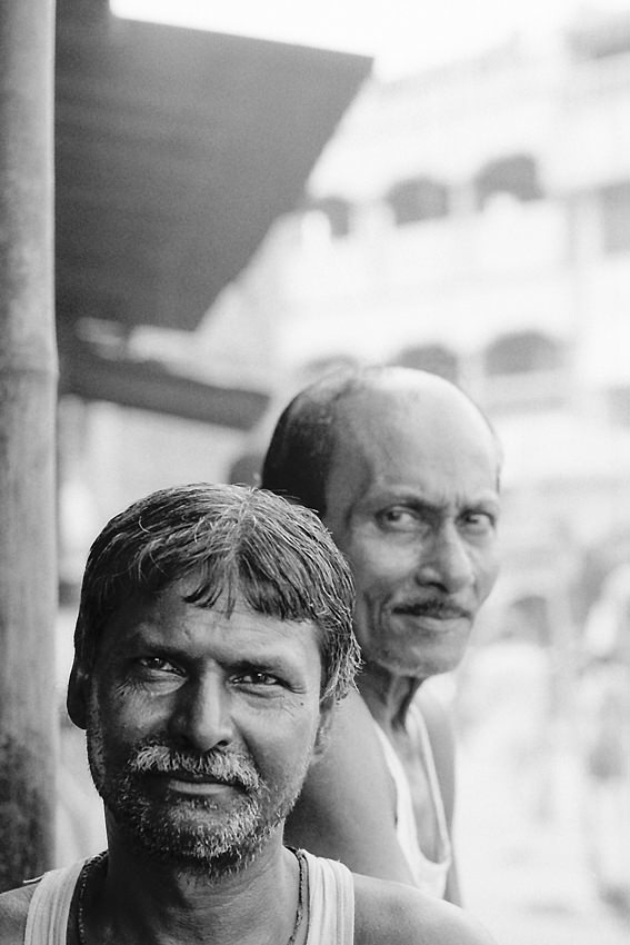 Men in chai stand