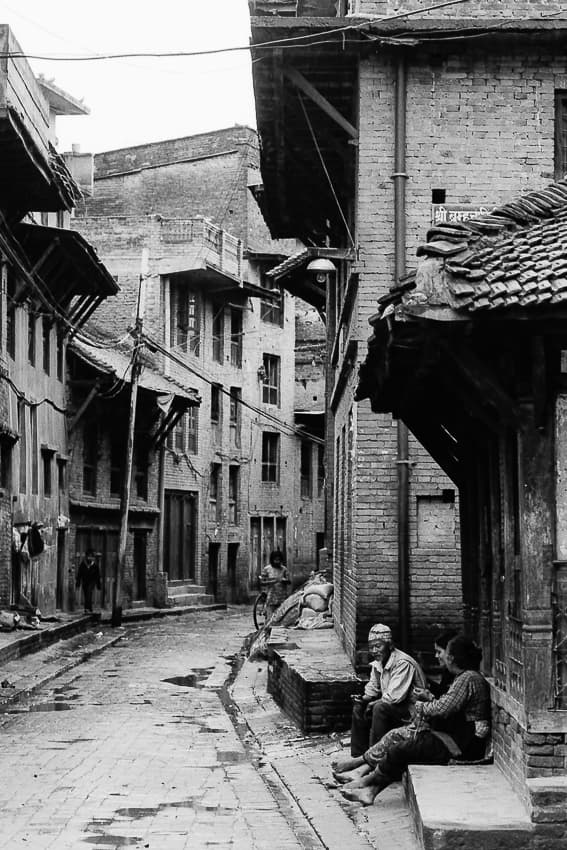 People chatting by wayside