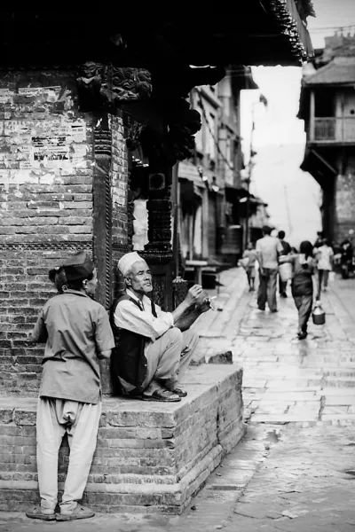 Men in corner of street