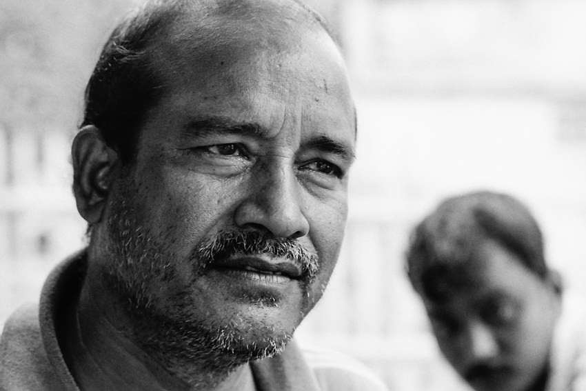 Bemused man in a chai stand