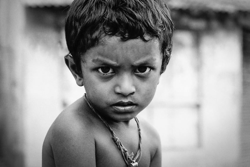 Boy with arch of eyebrow