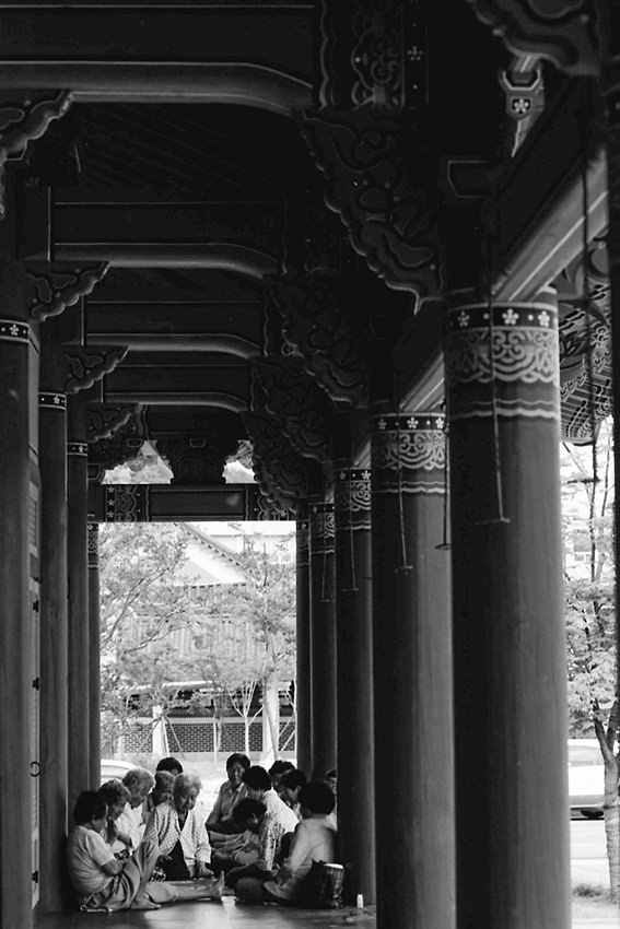 Women sitting together in the traditional hall