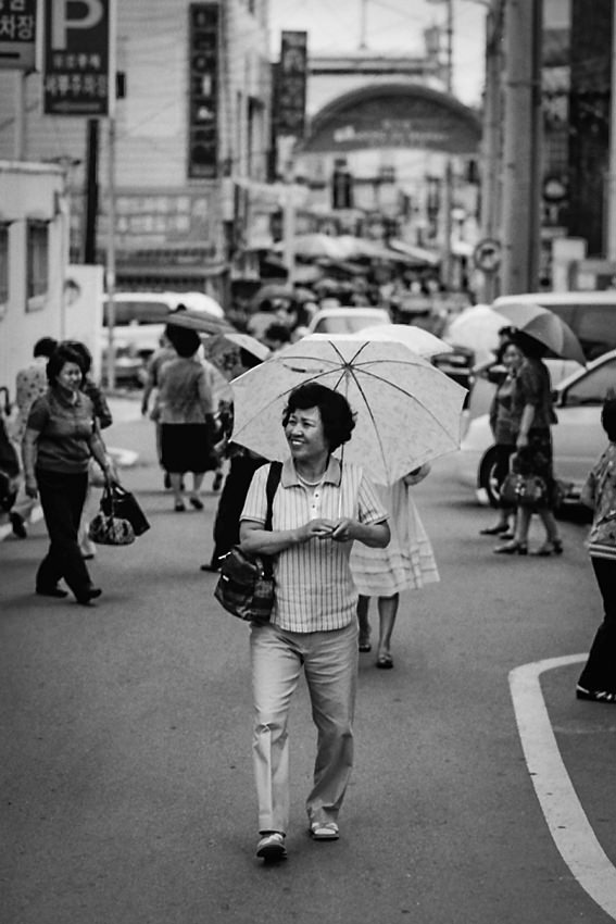 Woman walking while smiling