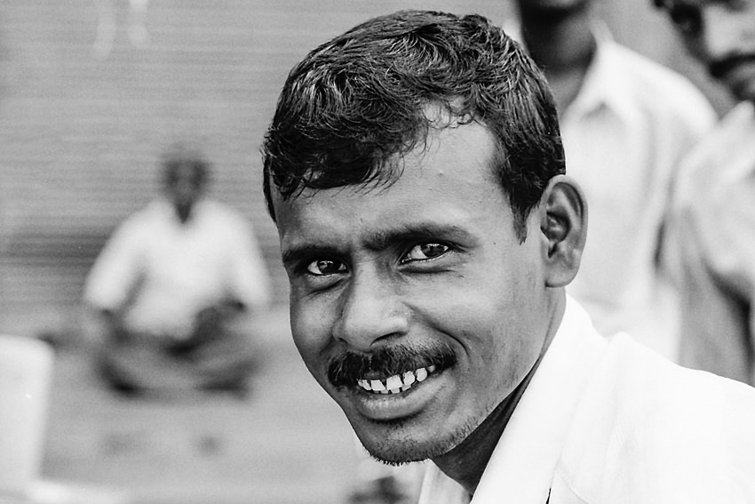 Man looking at camera curiously
