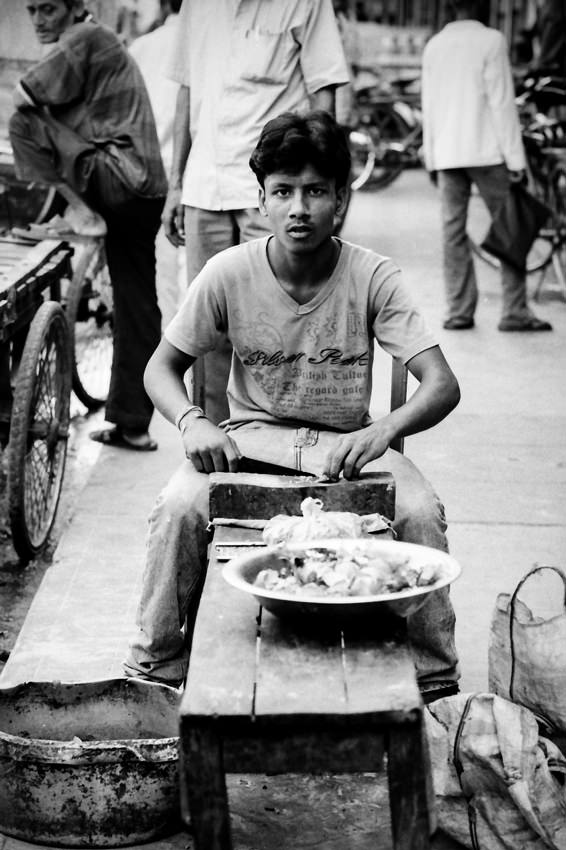 Man precooking by the roadside