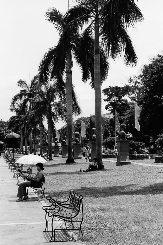 Women sitting on bench in Rizal Park