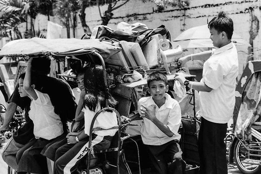 School boys and girls on trishaw
