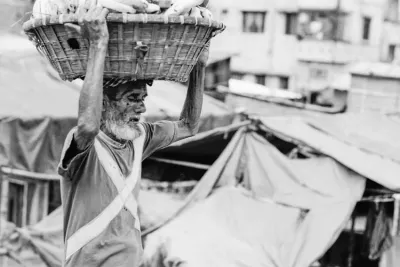 Old man carrying basket