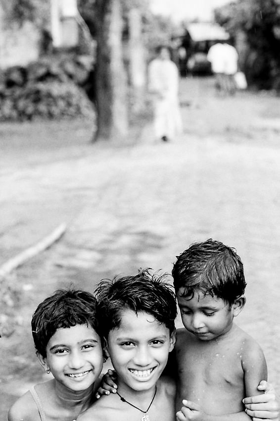Kids cuddling close together