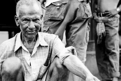 Old laborer resting