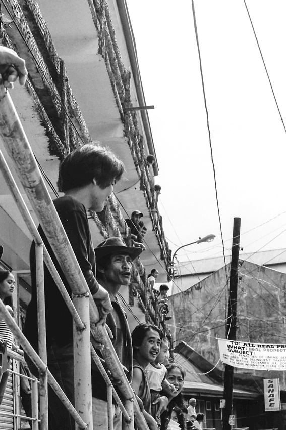 Audience watching the race from veranda