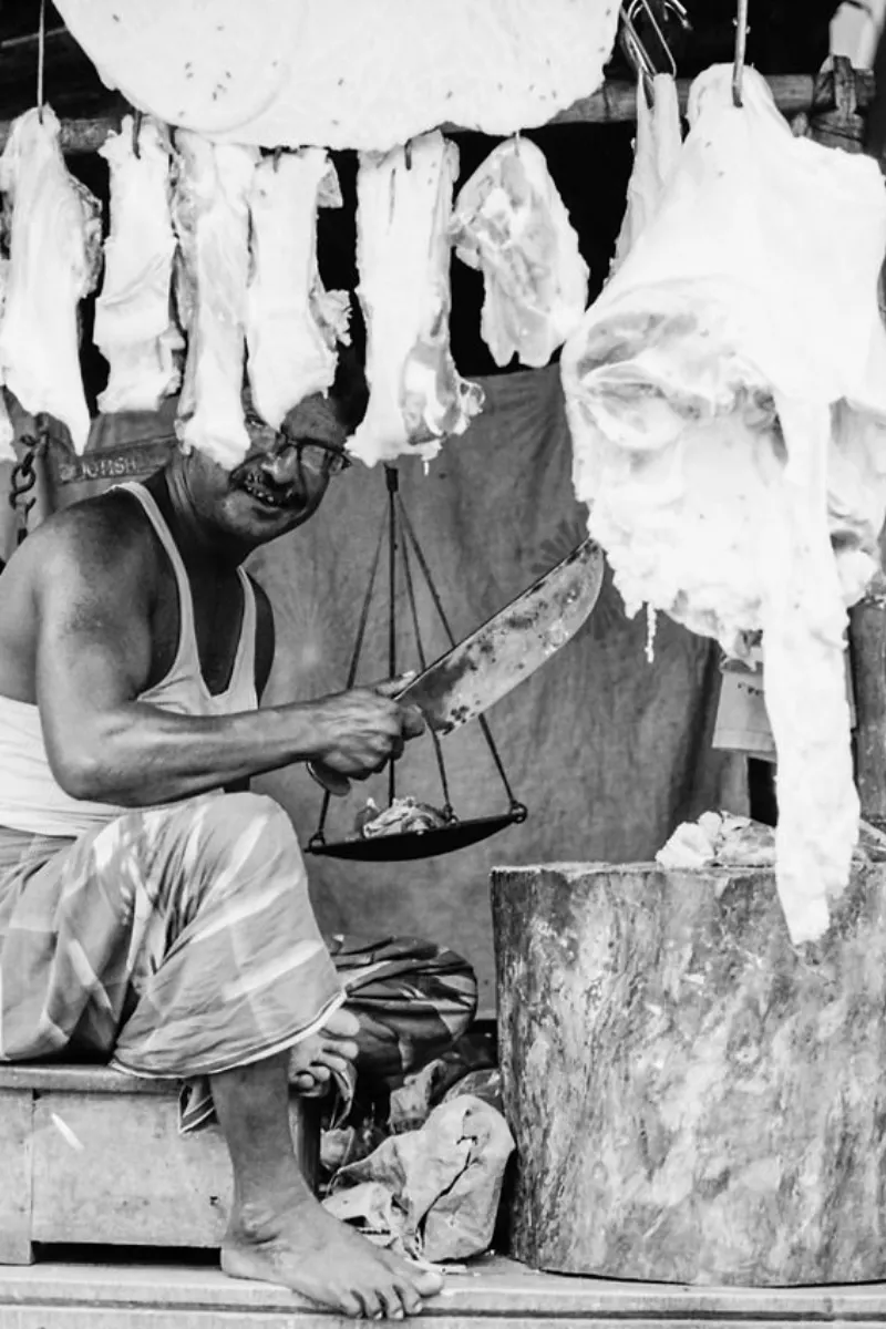 Butcher having kitchen knife