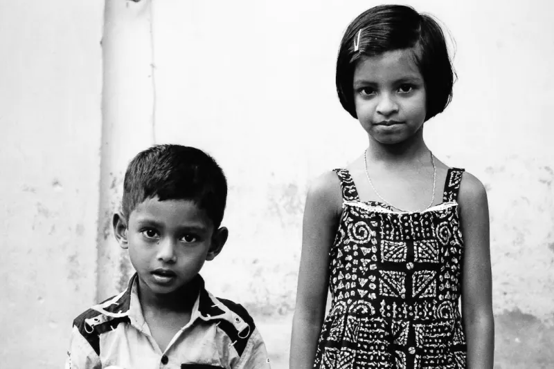 Boy and girl gazing at me