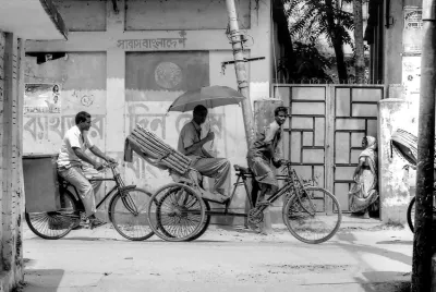 Cycle rickshaw passing by