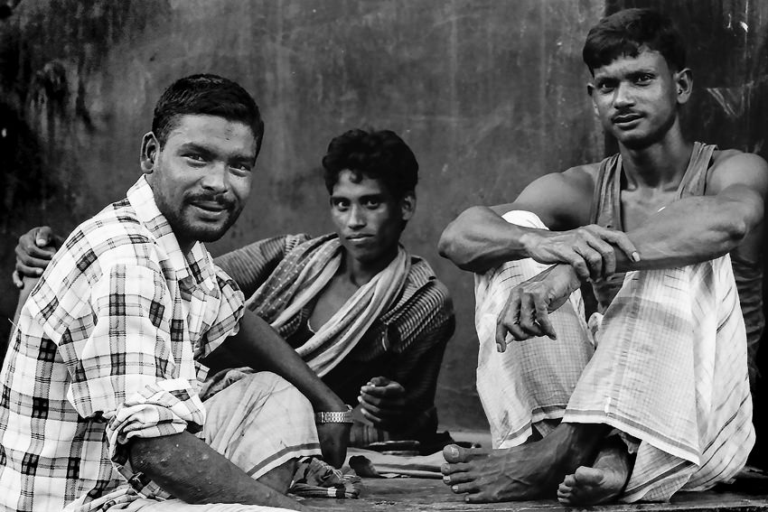 Three men taking a break