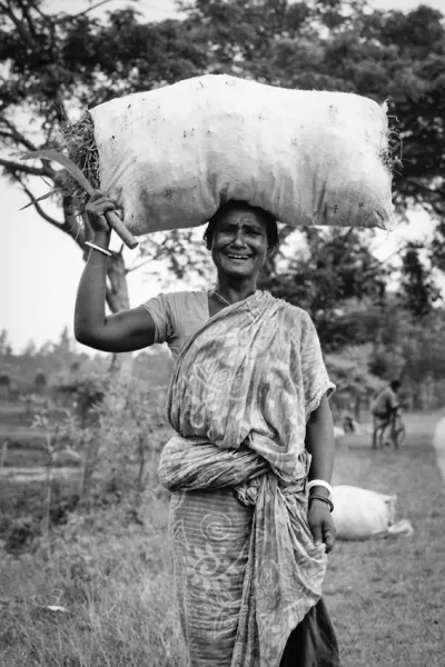 Woman putting big bag on head