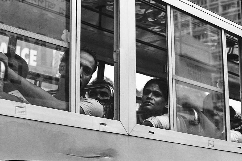 Opened windows of running bus
