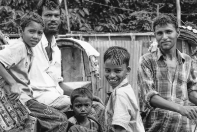 Men and boys around cycle rickshaw