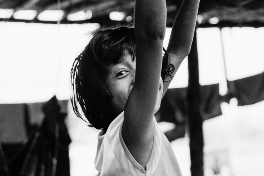 Girl putting arms up