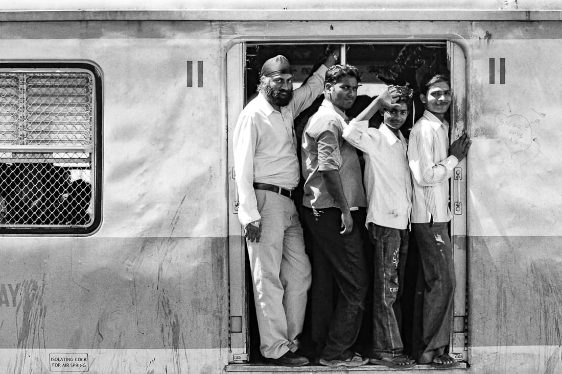 passengers on train coming to Chhatrapati Shivaji Terminus