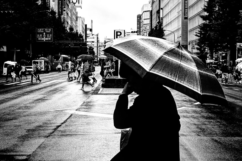 Umbrella on wide street