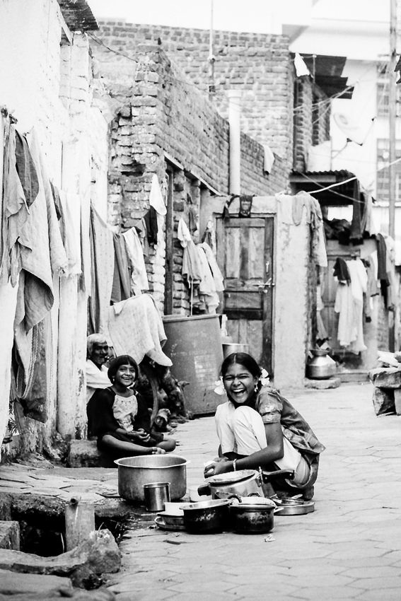 Girl washing pots