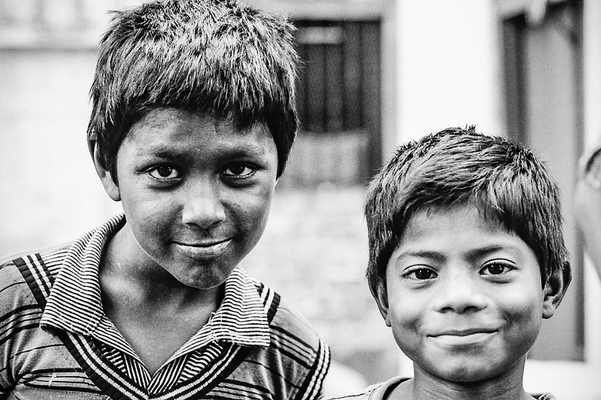 two boys puffing cheeks