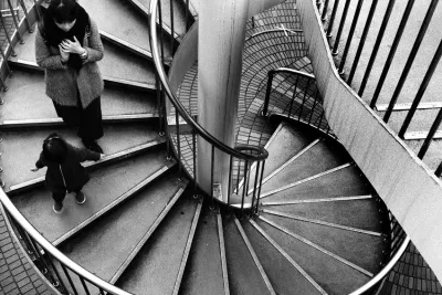 parent and child on spiral stairway