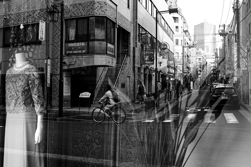 Street reflected on glass window