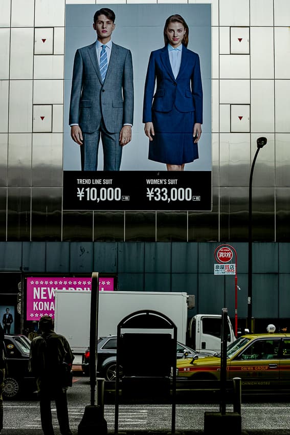 Young man and woman in a poster on wall