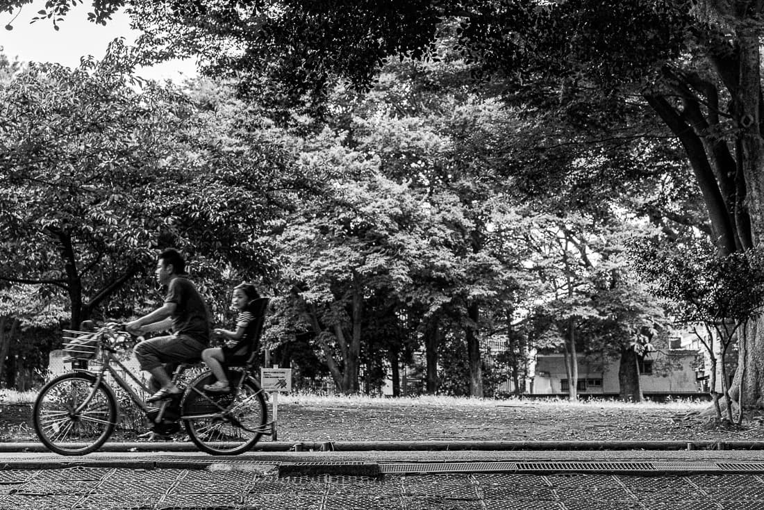 Father and daughter on bicycle