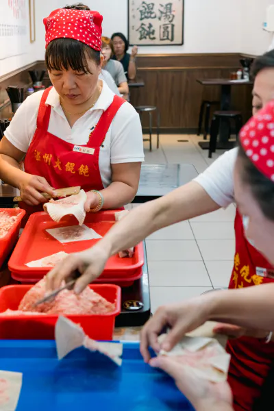 Women making Wonton