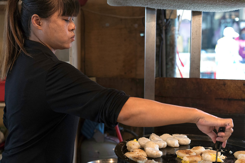 Woman cooking radish cake