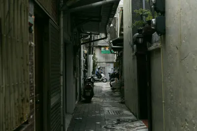 Scooter running alleyway