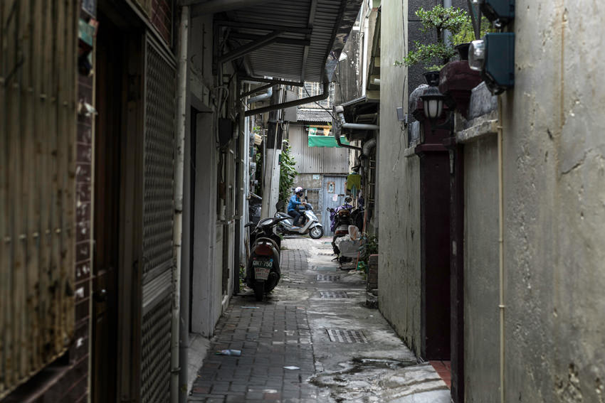 Scooter running alleyway