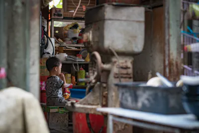 little boy in a shop