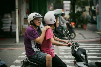 Old couple on a motorbike