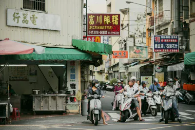 Scooters waiting for traffic light