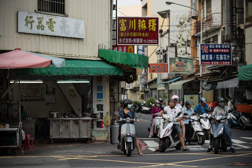 Scooters waiting for traffic light