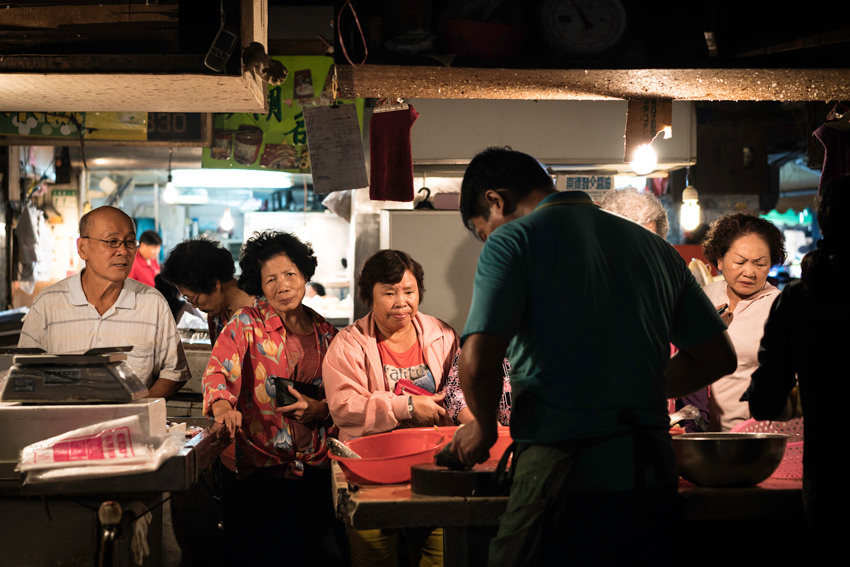 Customers in butcher