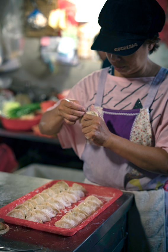 Woman making dumplings
