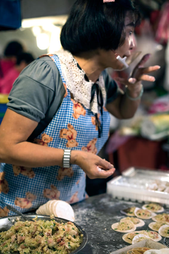Woman working in delicatessen